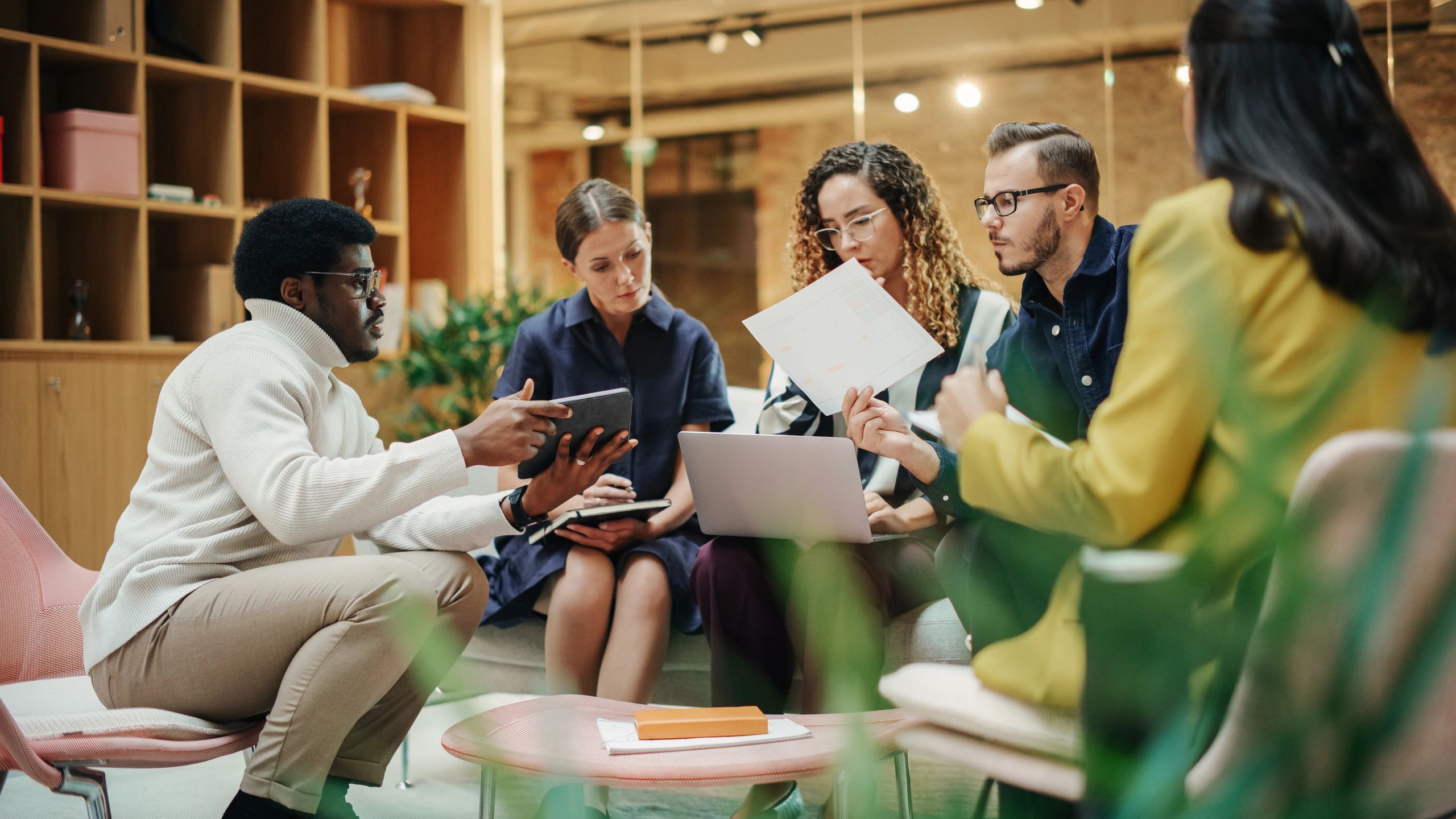 Consulting team presenting ideas in a meeting