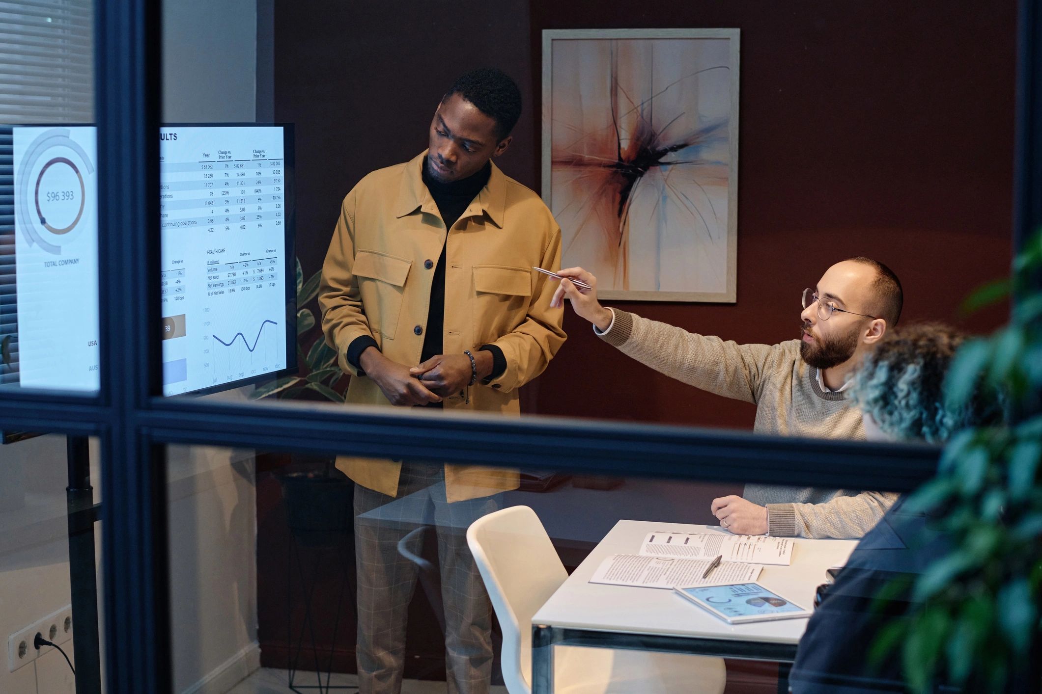 Business team reviewing operations data in a conference room
