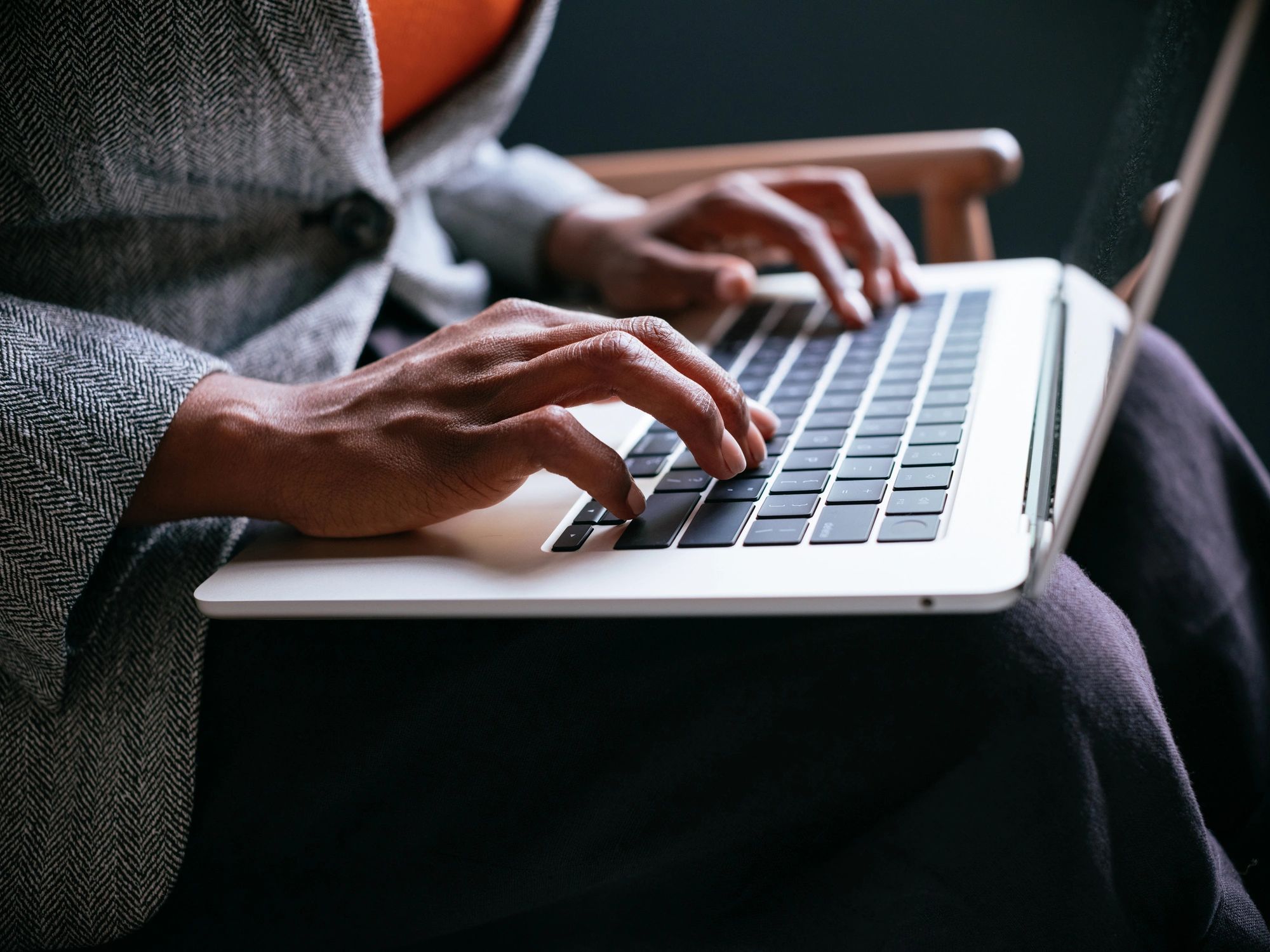 Professional working remotely on a laptop