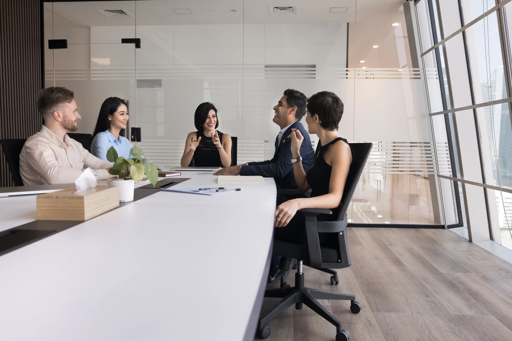 Professional business team collaborating in a modern meeting room