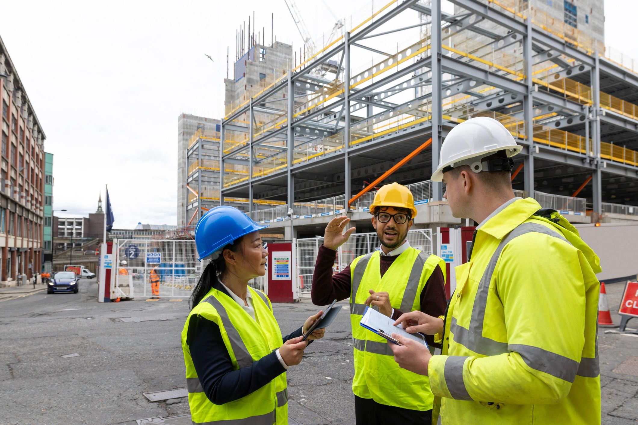 Construction professionals reviewing plans together